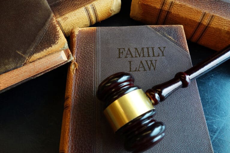 Family law book on desk symbolizing legal guidance and support
